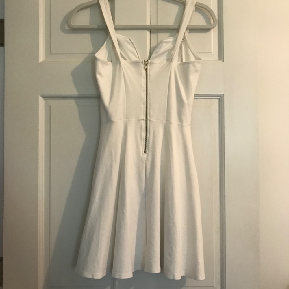 Beautiful White Dress with a Plunging Neckline - Picture 2 of 3